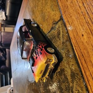 Vintage Black and Yellow Toy Car with Flames